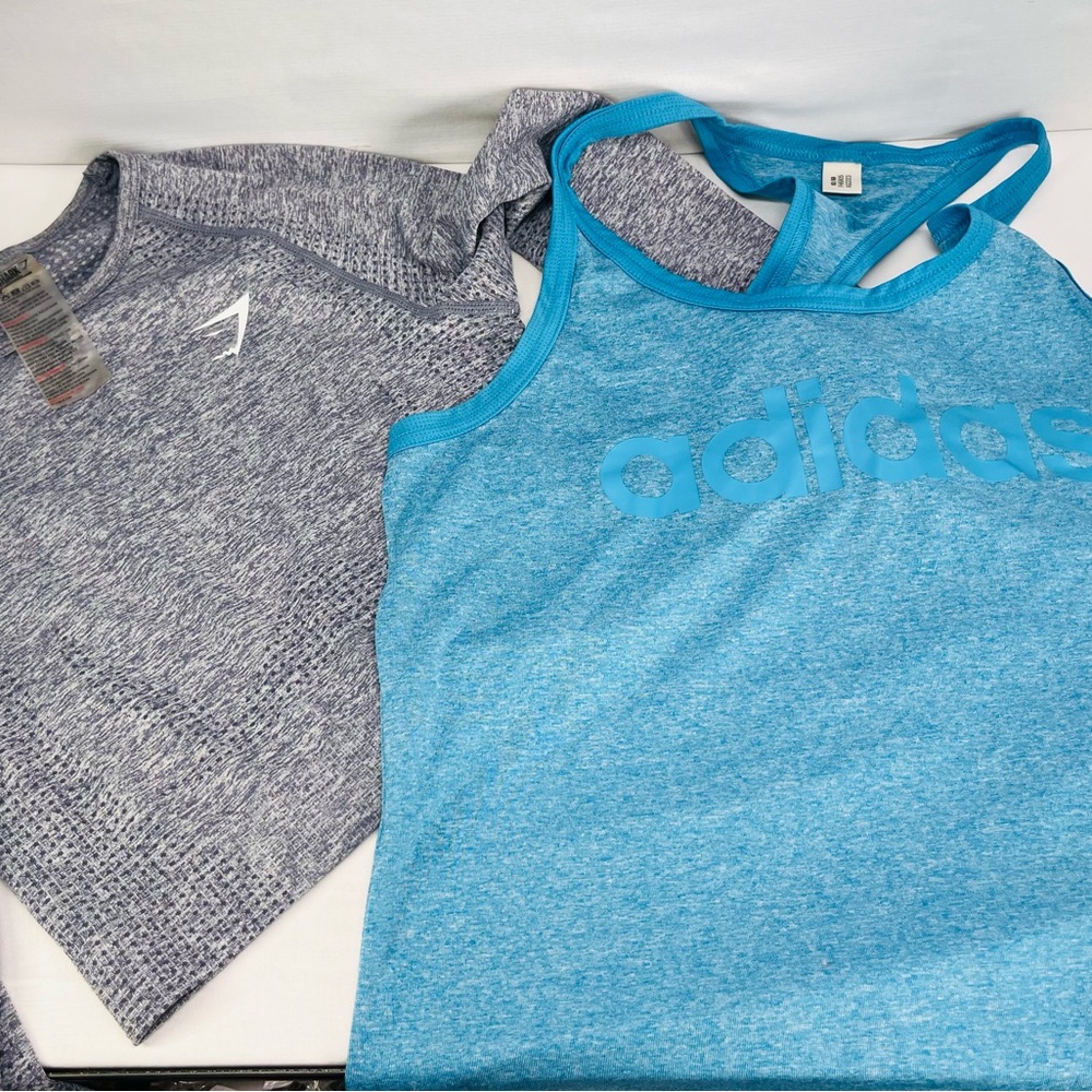 Adidas Blue razor back tank and Gymshark Long Sleeve‎ cropped Tee